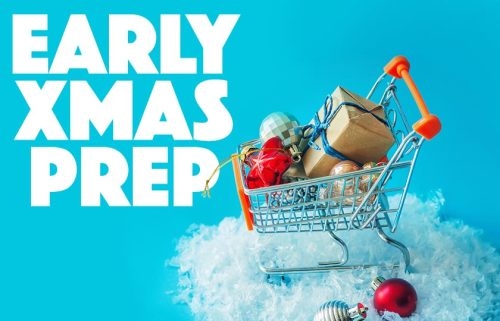 A trolley full of presents and Christmas decorations, one a little patch of snow.