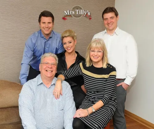 Peter and Elisabeth Paterson - founders of Mrs Tilly's Scottish Confectionery - with with their family who help run the business today.