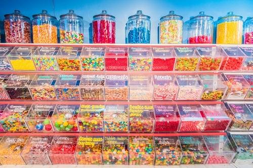 A range of candy available within a store setting