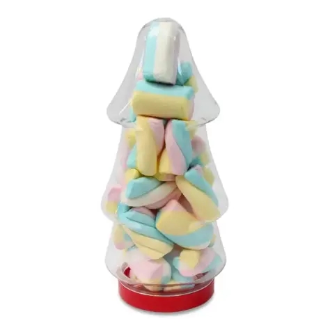 A Christmas tree shaped plastic sweet jar